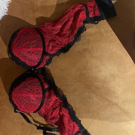 A burgundy bra