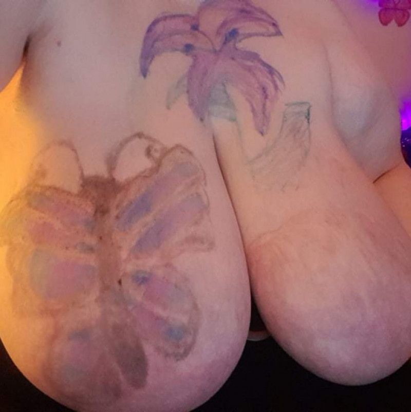 Painted titty tattoos