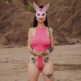 Pink bodysuit and bunny mask