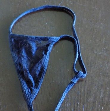 Sheer Rose pattern black thongs!