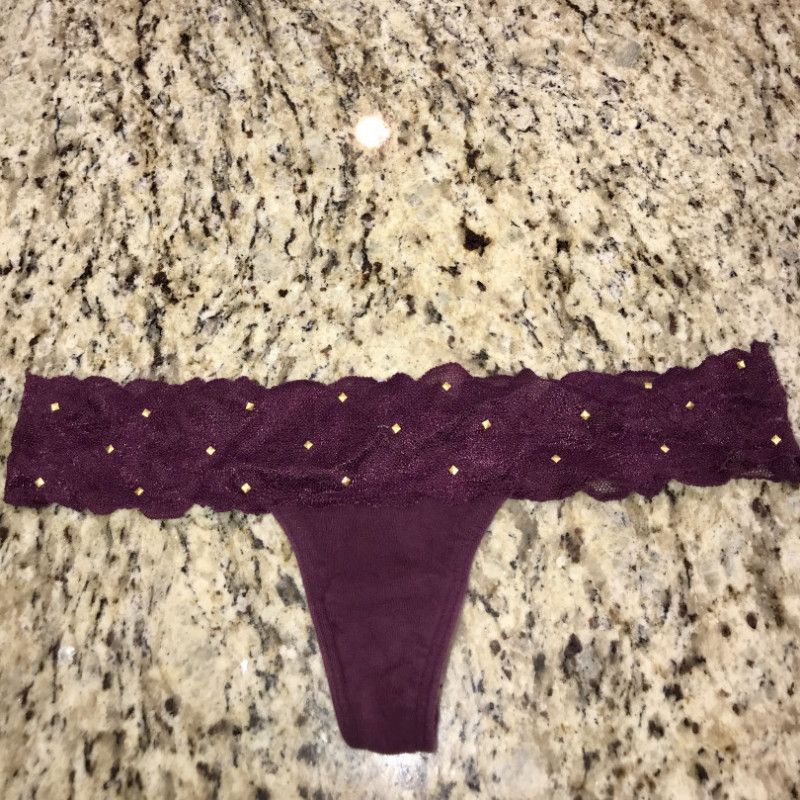 Burgundy with little gold studs thong