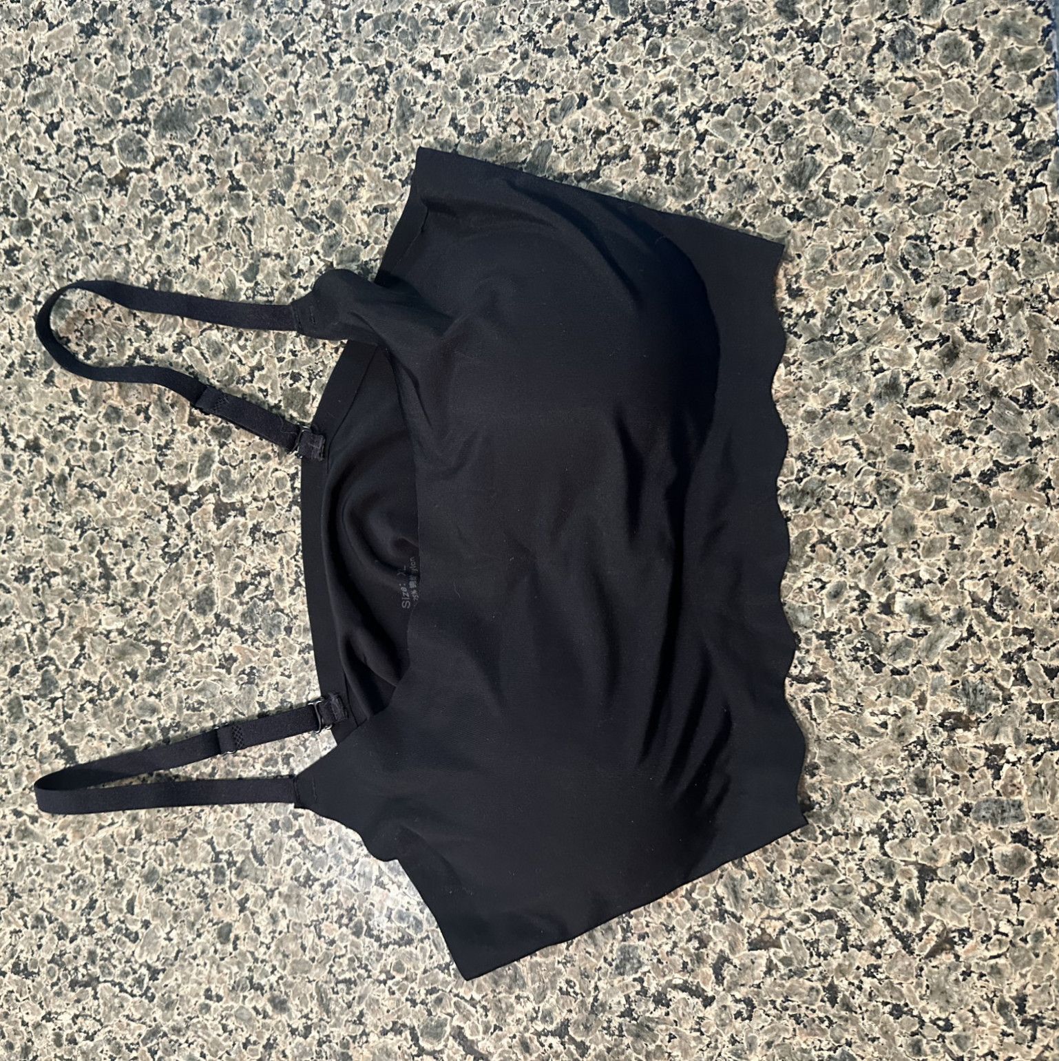 Used large black size large sports bra 36DD juices covered