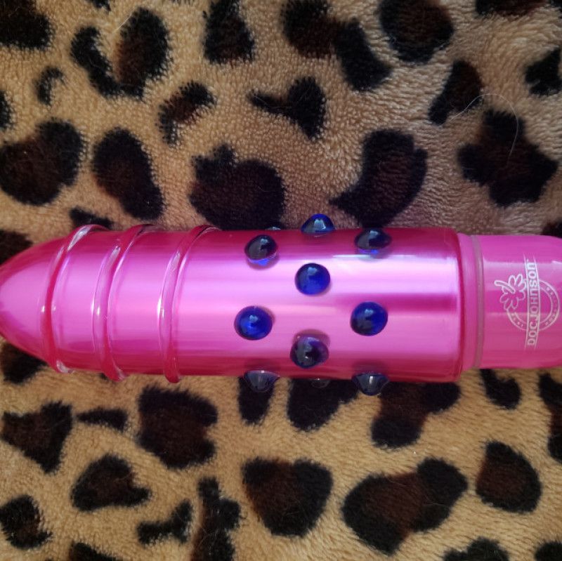 Used pink glass vibrator toy