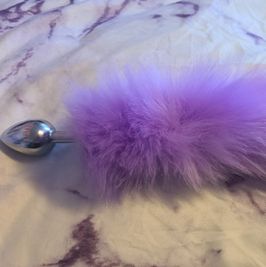 Purple furry butt plug tail