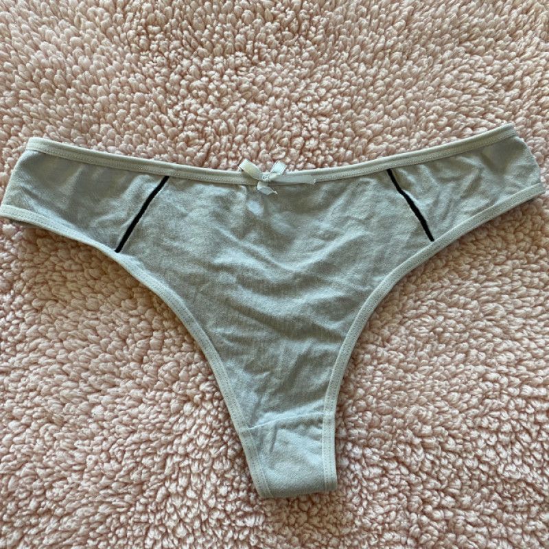 Worn dirty Gray cotton thong with bow