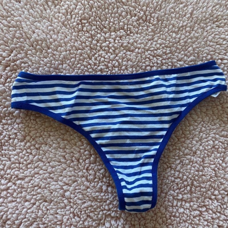 Worn blue white stripped cotton thong