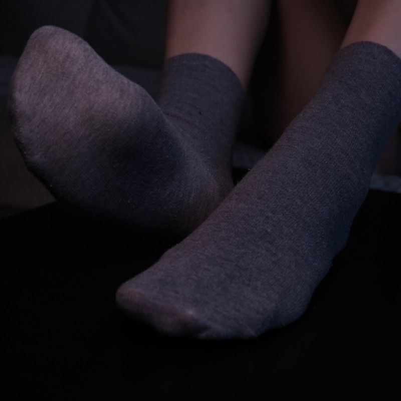 WORN GREY SOCKS