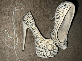 White jeweled high heels