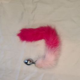 Used Stainless steel butt plug with pink and white tail