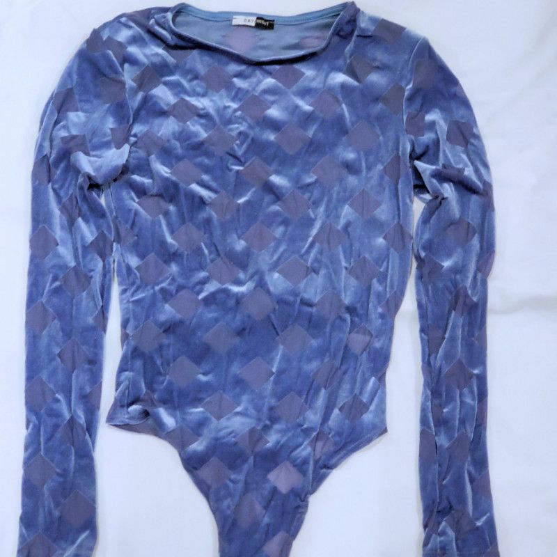 Lily Glee worn blue bodysuit