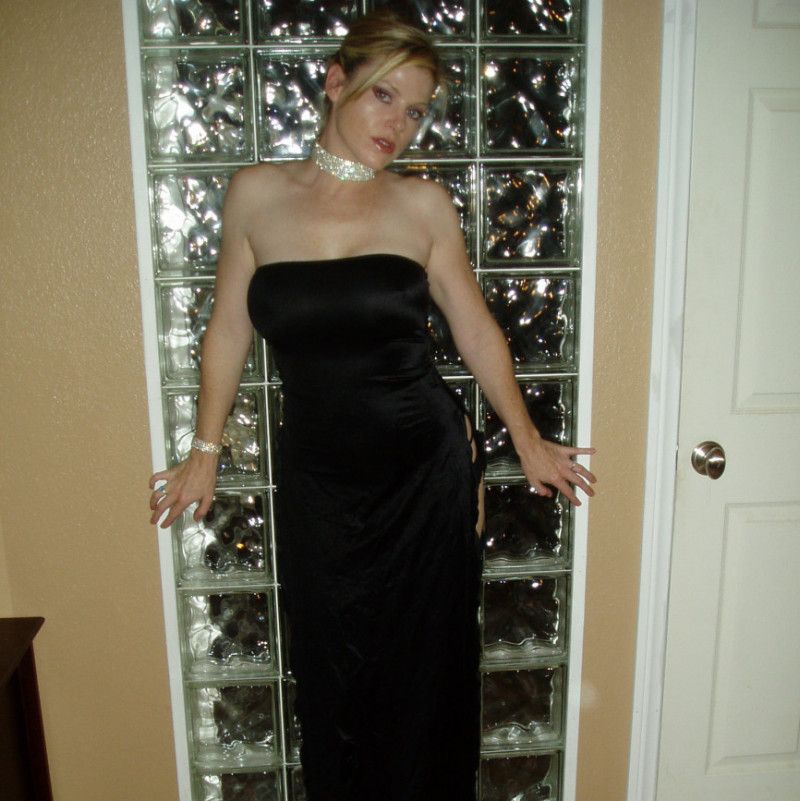 112 pics in a long black dress