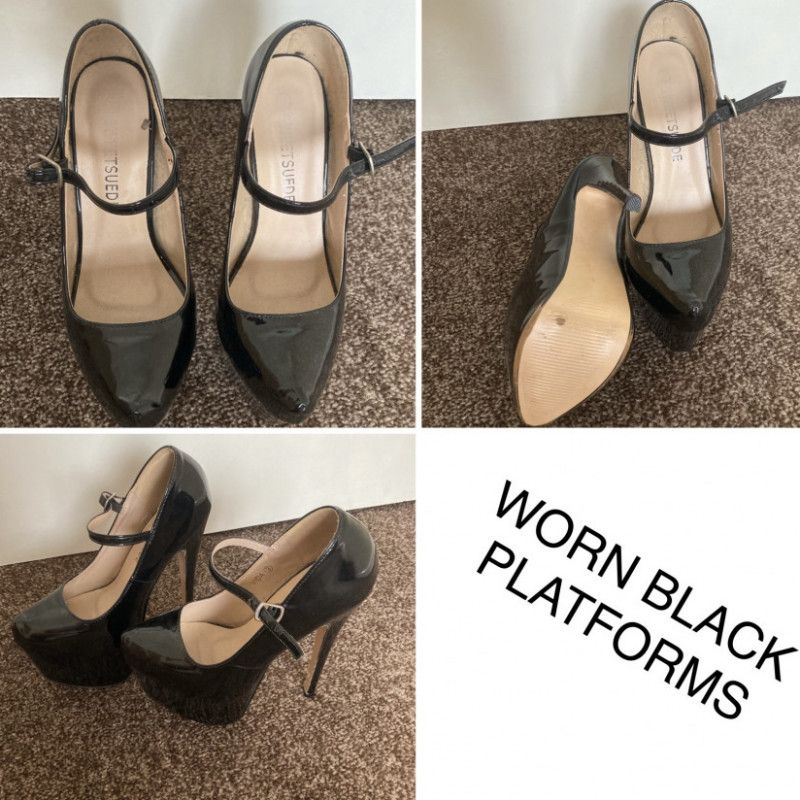 WORN BLACK PLATFORMS