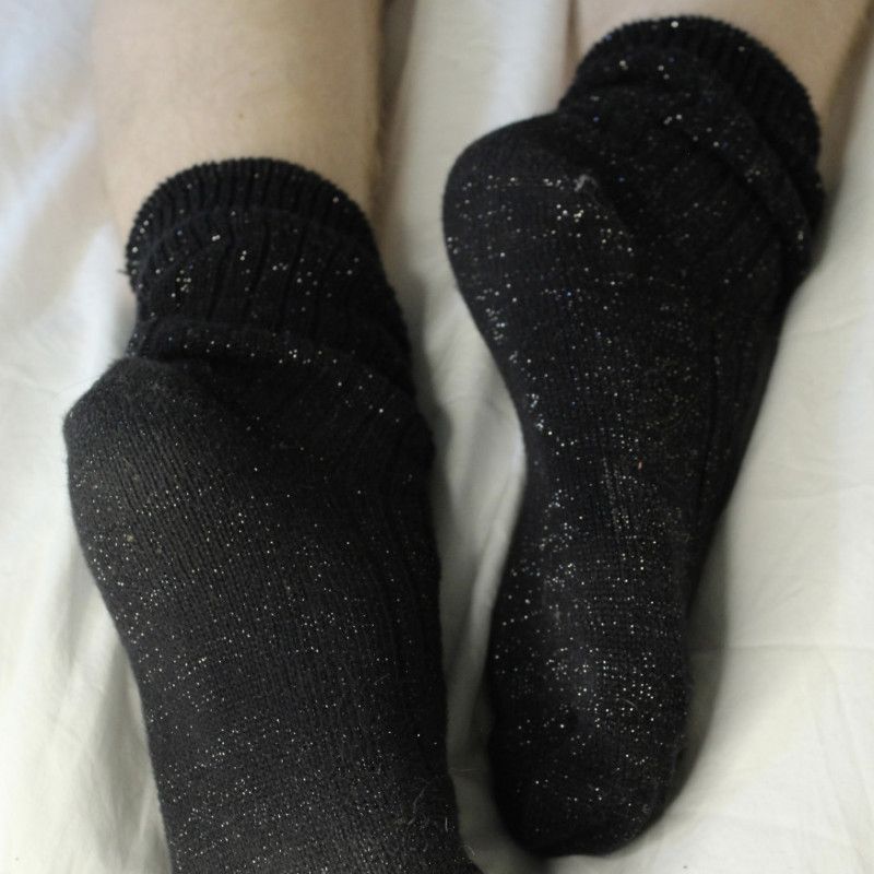 Worn Sparkly Black Socks