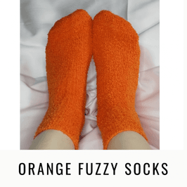 Orange fuzzy socks