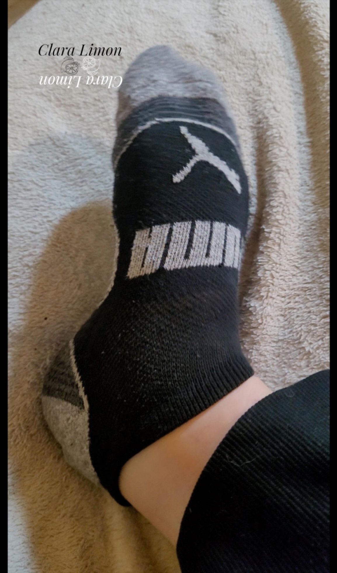 dirty black and grey puma crew sock