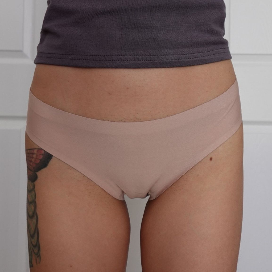 form fitting nude bikini panties