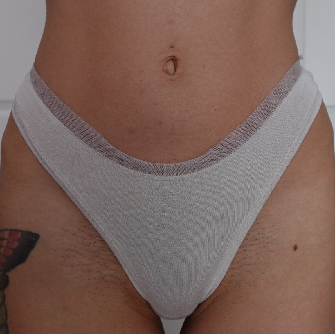 white cloth mesh edge thong