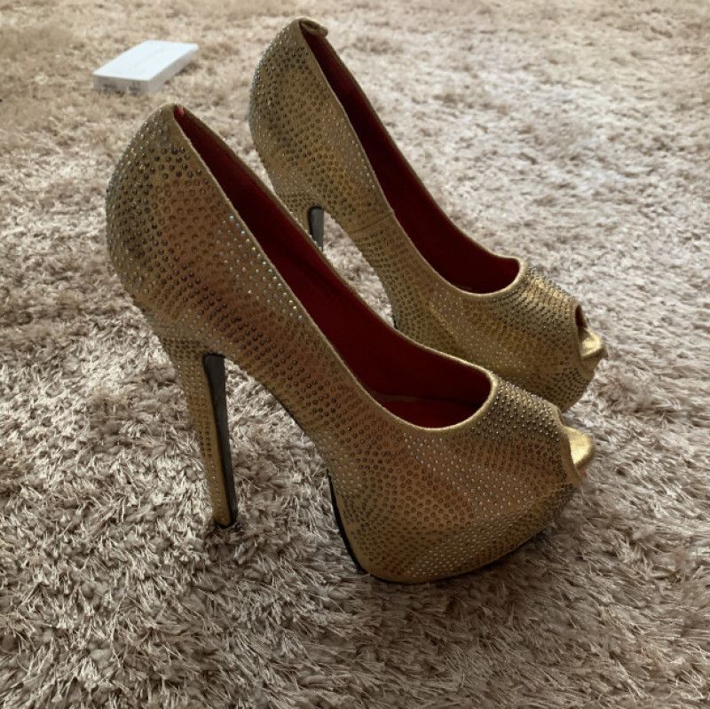 Gold stilettos