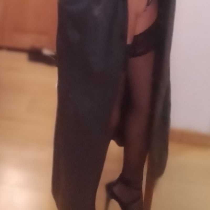 Fetish with leather  trench and lingerie bodysuit