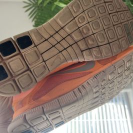 Orange 8 year worn gym shoes