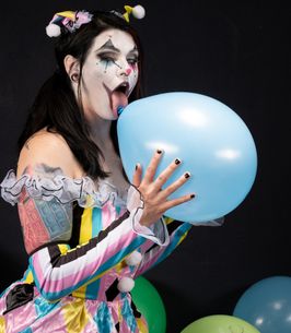 Clown Plays With Balloons