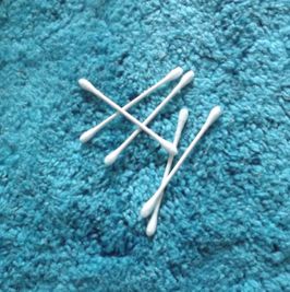 5 used qtips  cotton swabs from my ears