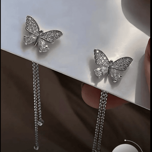 Beautiful earrings with butterfly