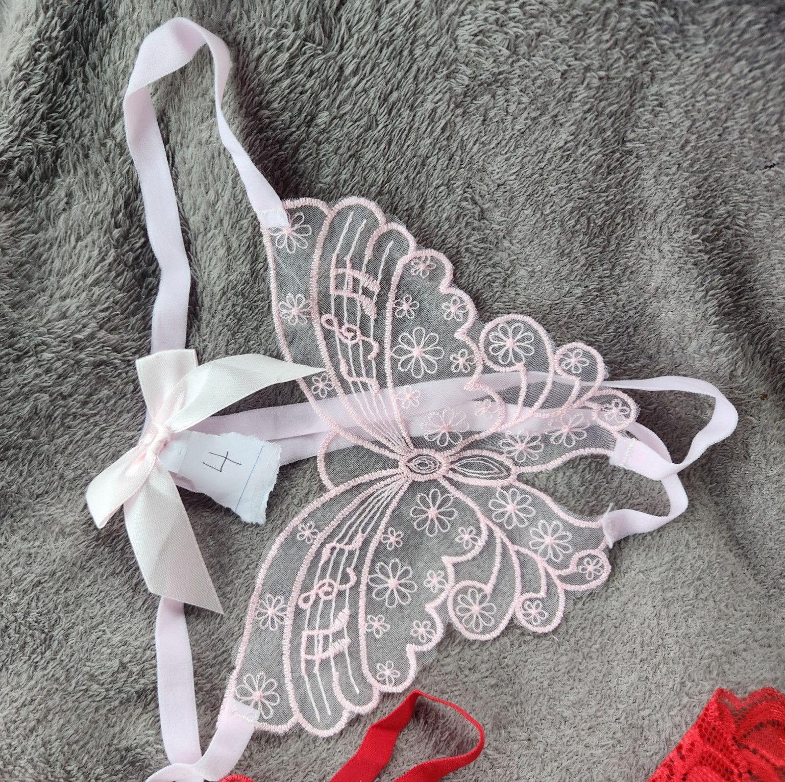 Pretty butterfly panties in pale pink worn for your taste