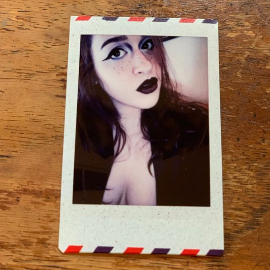 Dark Makeup and Cleavage Selfie Polaroid