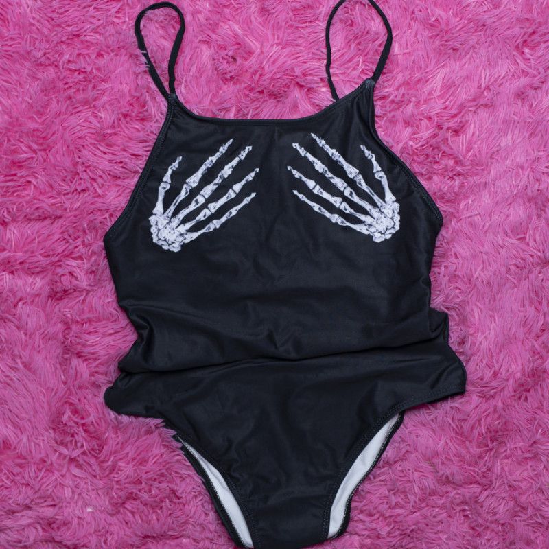 Black swimsuit with white skeleton hands