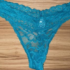 Naught blue lace thong