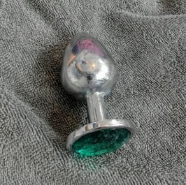 large used emerald  buttplug