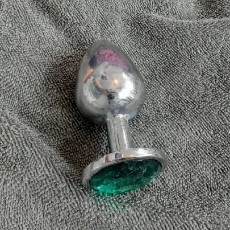 large used emerald  buttplug