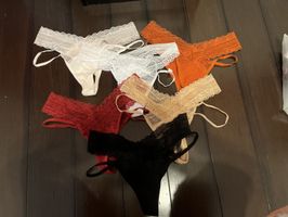 Strap lace thongs