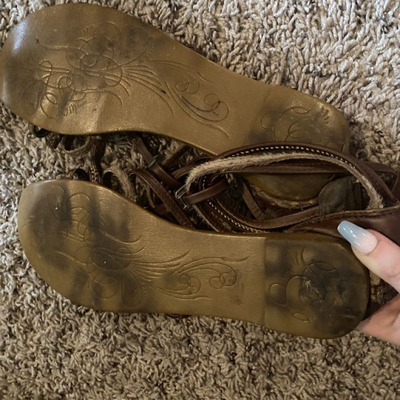 2 pairs of worn sandals