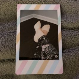 Feet in ped socks Polaroid