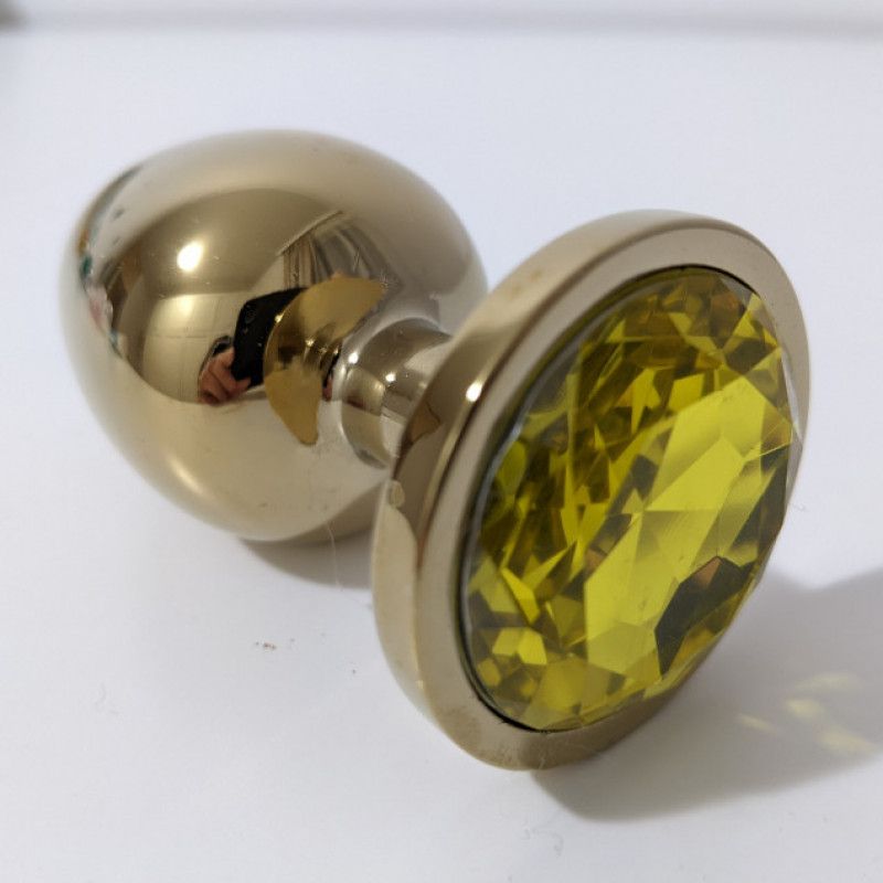 Used butt plug yellow