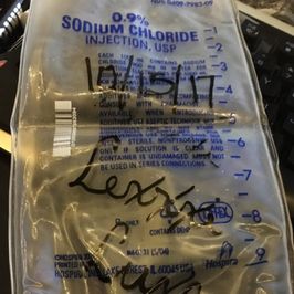 Empty Signed Saline Bag