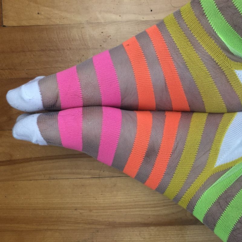 Feet in rainbow socks photoset