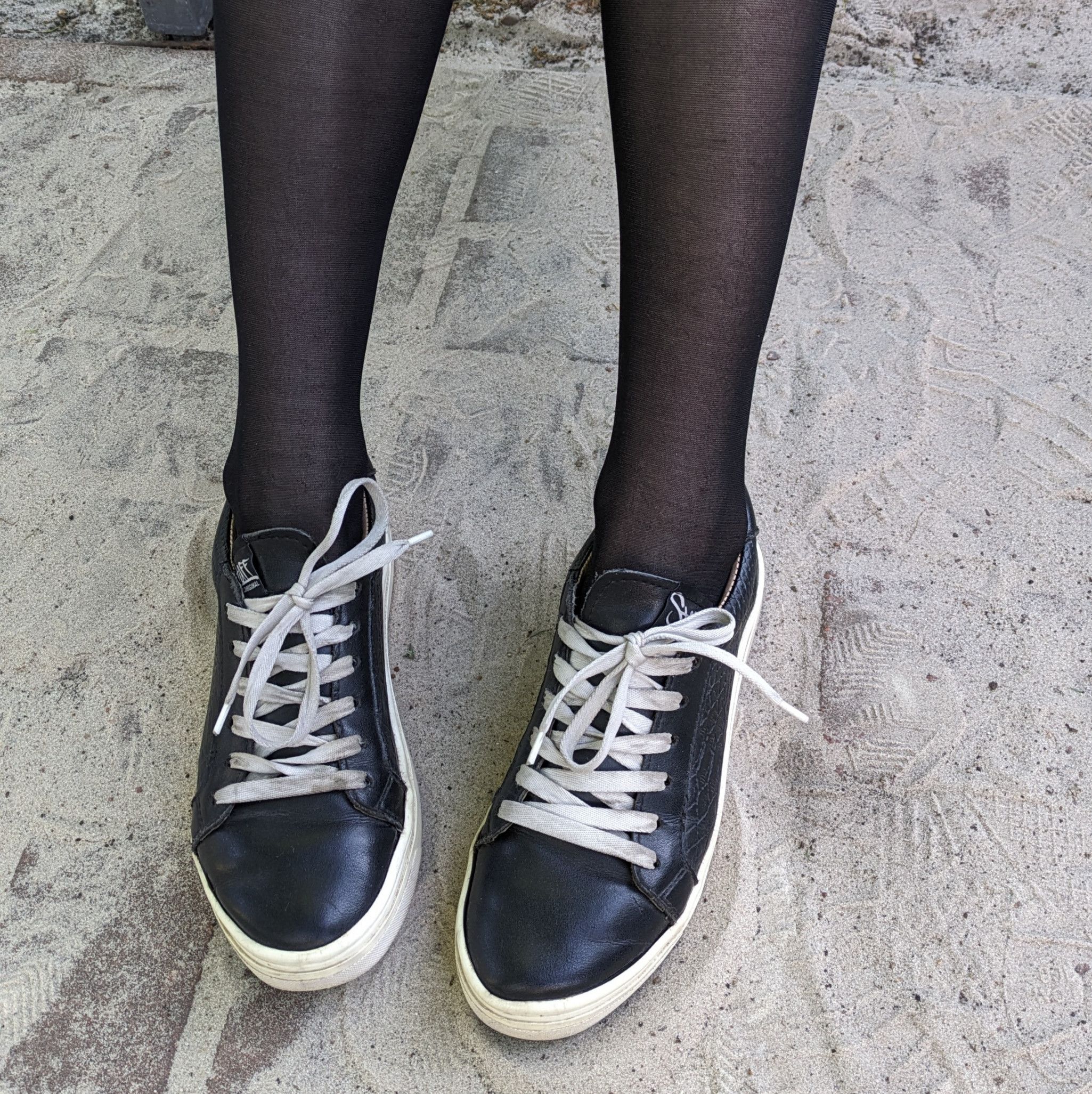 Black leather sneakers