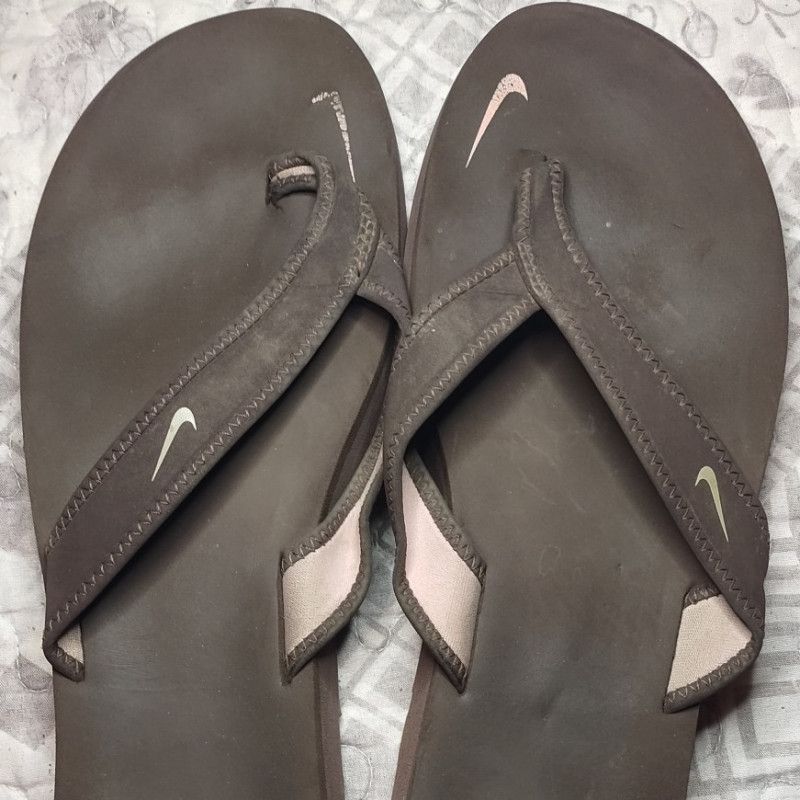 Very Well Worn Nike Flip Flops