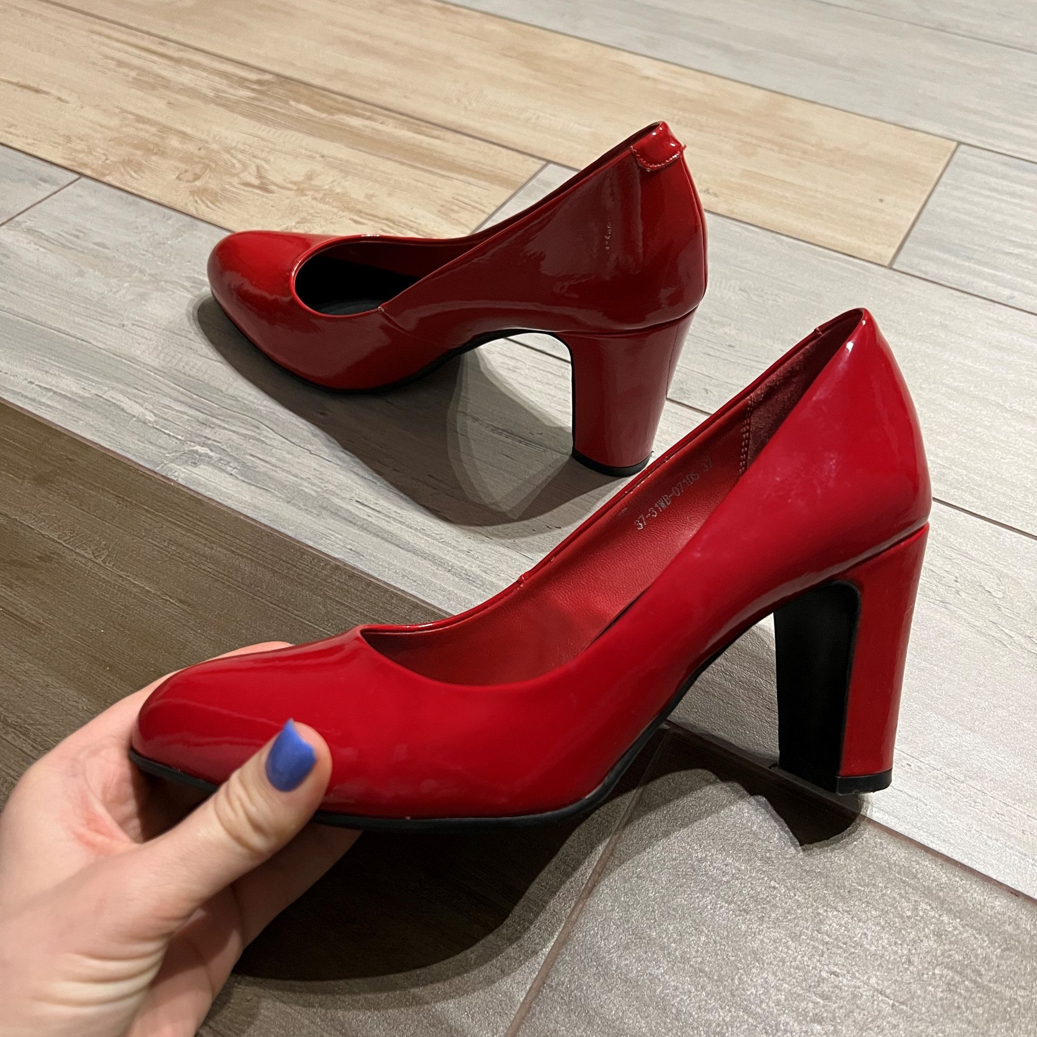 Red patent leather shoes with heels