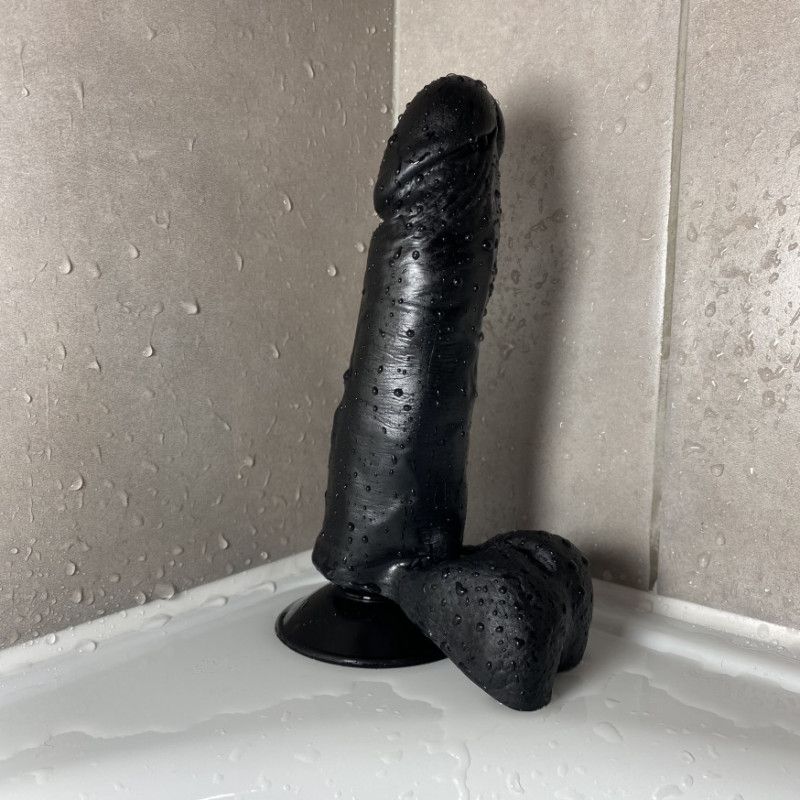 Used large black dildo