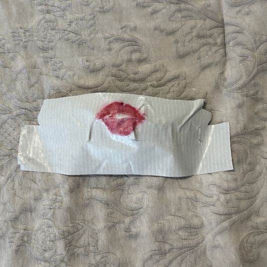 Gray Piece of Duct Tape with Lip Print