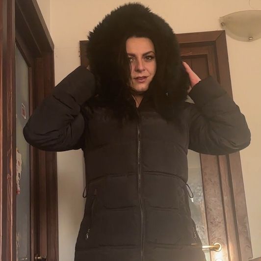 winter puffer coat with a lut of cum on it