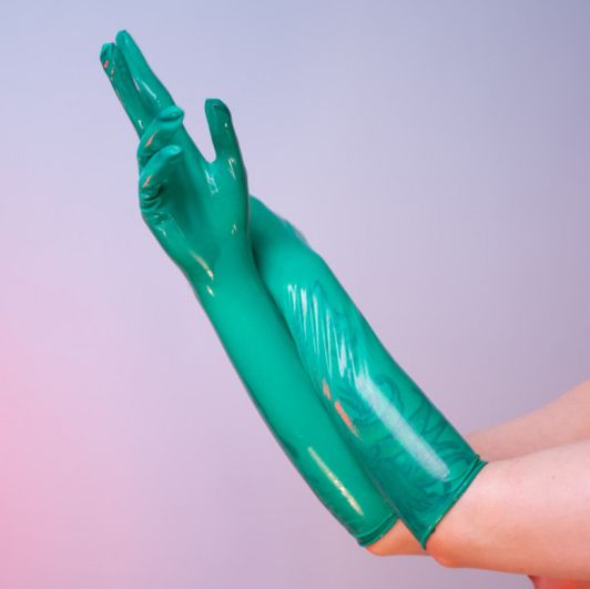Green surgical gloves