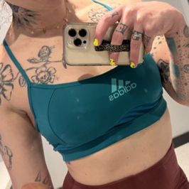 Sweaty teal sports bra