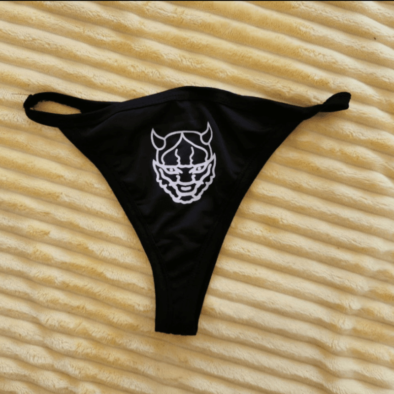 Black synthetic thong with demon print