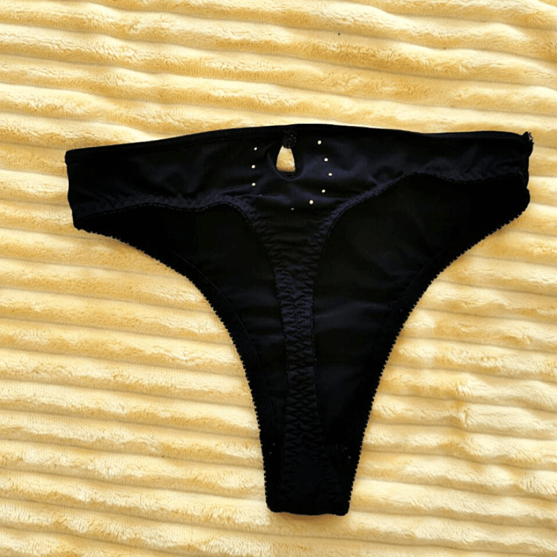 Black thong synthetic with cutout