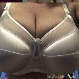 Extremely Well Worn White Satin Bra